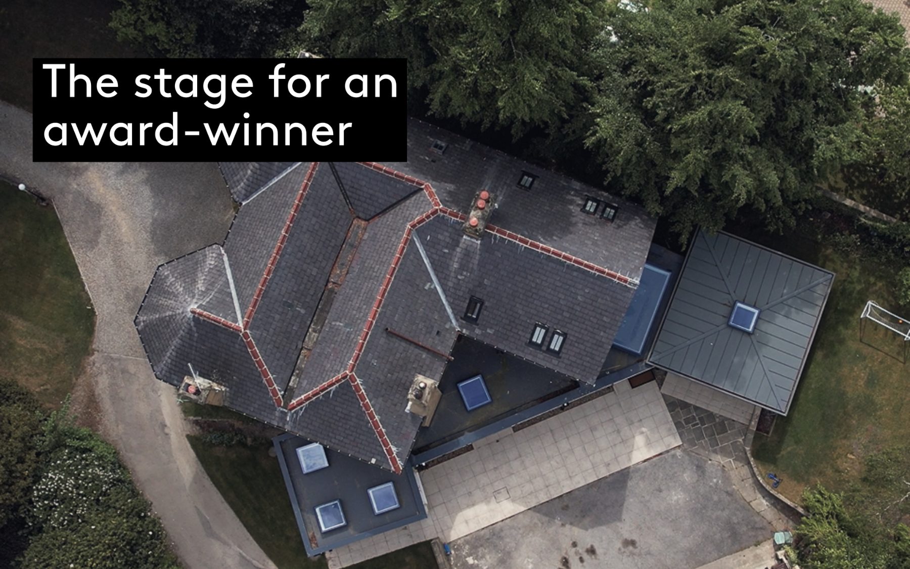 Aerial view of the extended Victorian home on Park Avenue, Roundhay, showing the garden pavilion glass roof and the new outbuilding